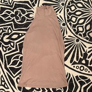 Nude sleeveless turtleneck open back top